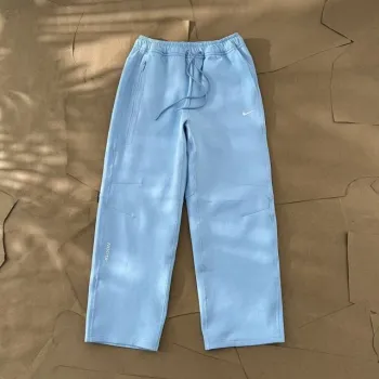 Pantalon de survêtement NOCTA x Nike Tech Fleece ourlets ouverts bleu cobalt