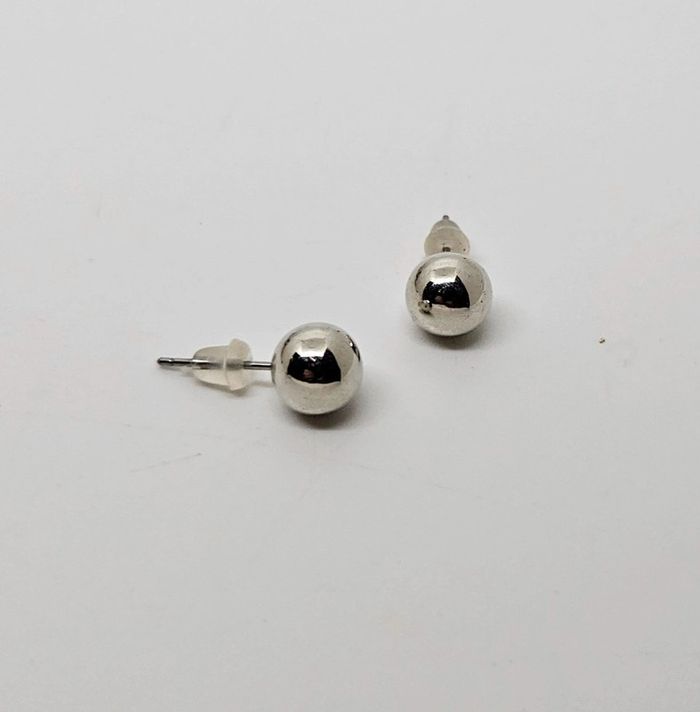 Paire de boucles d'oreilles. Neuve. Argenté 4