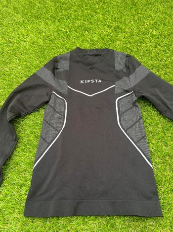 Très beau tee shirt blouse  Kipsta taille 6 ans
