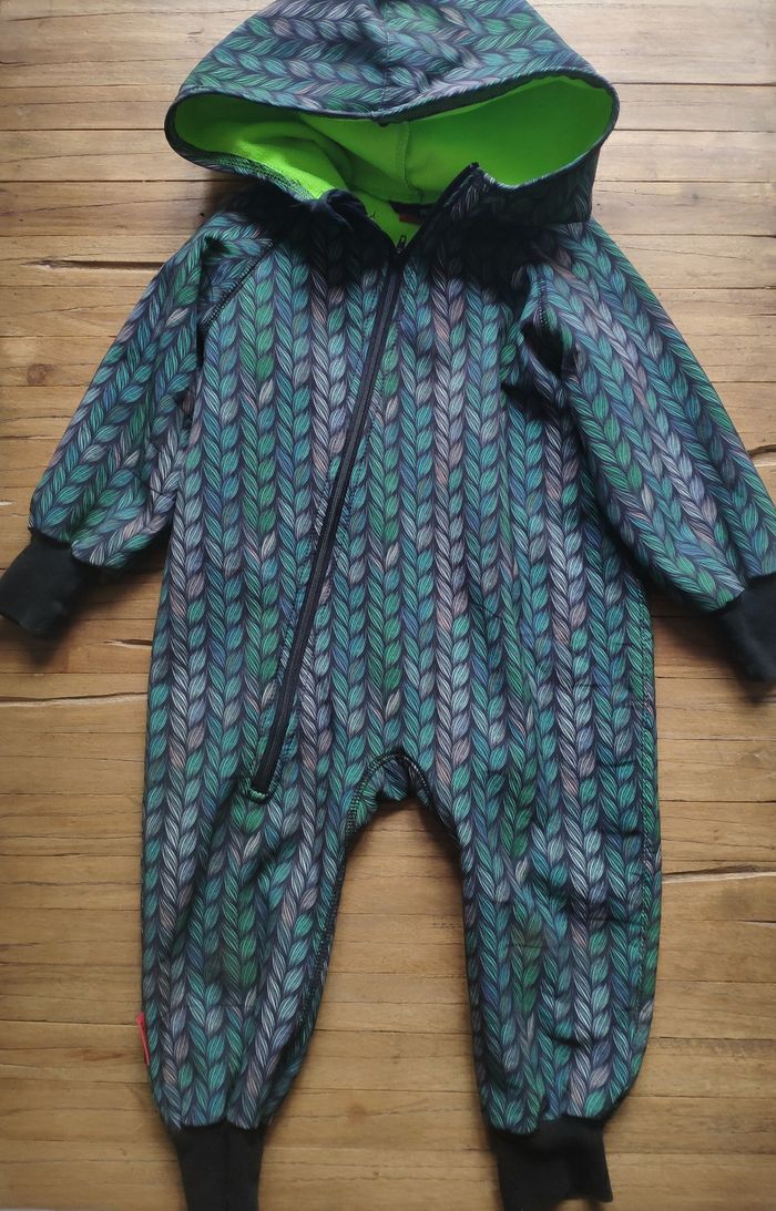 Combinaison imperméable et coupe vent