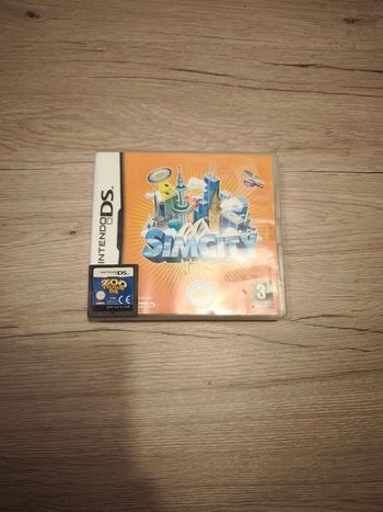 Lot jeux DS zoo Tycoon et simcity