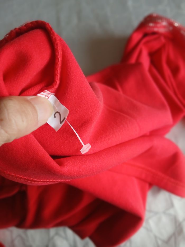 Pull a col roulé rouge a strass M - photo numéro 3