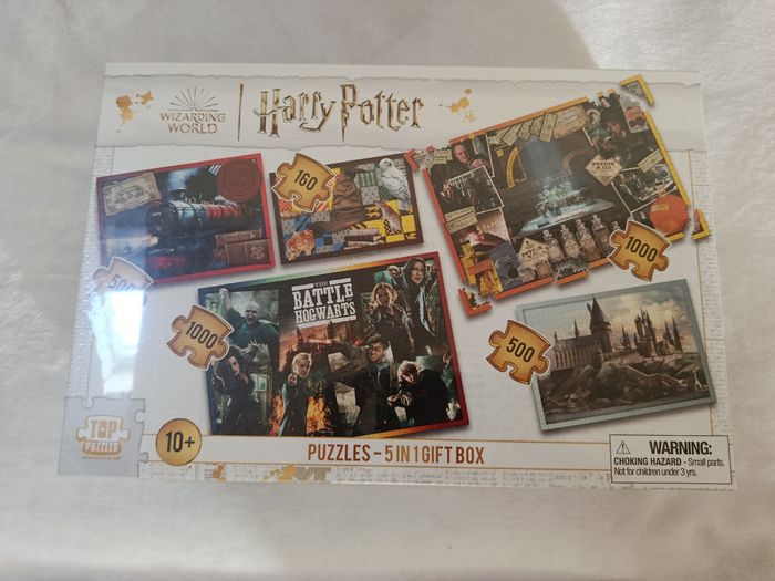 A saisir, NEUF , pack de 5 puzzles " Harry Potter" (Bien lire merci)