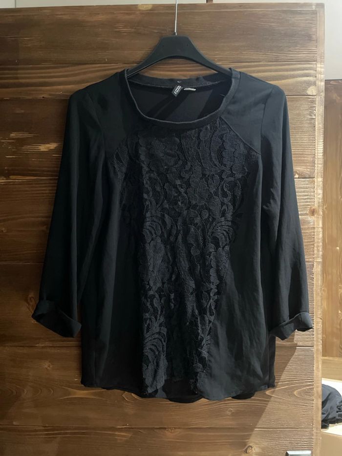 Blouse style sweat noir avec dentelle