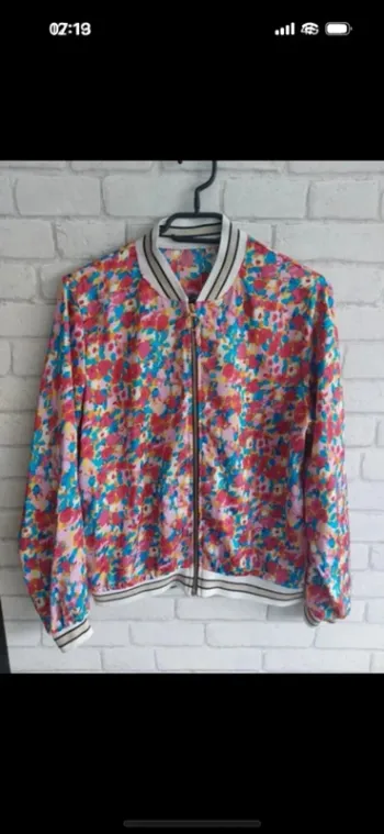 Veste légère taille unique correspondant à un M