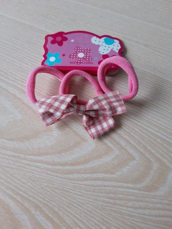 Élastique rose 1 nœud rose a carreaux