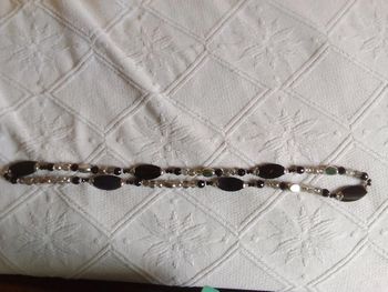 Collier sautoir noir et argenté