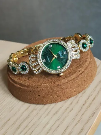 Montre bracelet doré, vert, style royal