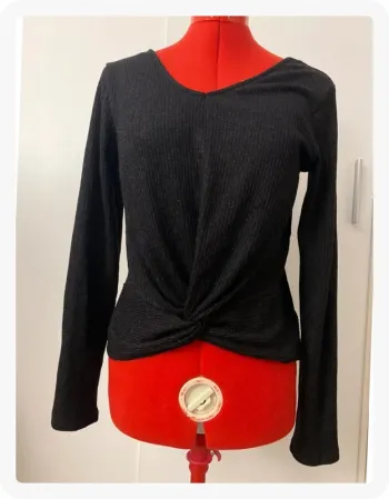 Pull noir brillant torsadé Kiabi
