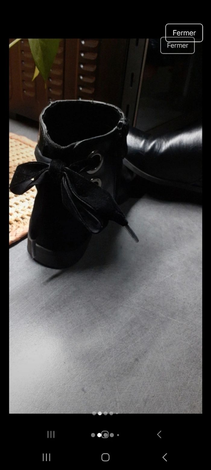 Très jolie bottines noir à nœud velours au talon