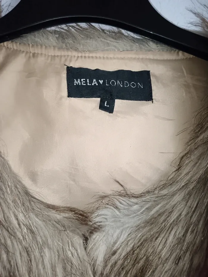 Veste sans manche femme fausse fourrure Taille L 40/42 - photo numéro 4