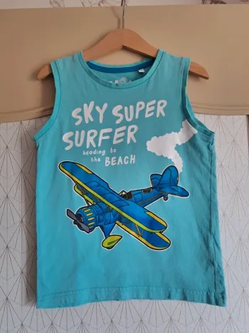 Débardeur garçon turquoise palomino 6 ans 1 micro tâche qu'on ne voit pas