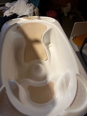 Table à langer baignoire