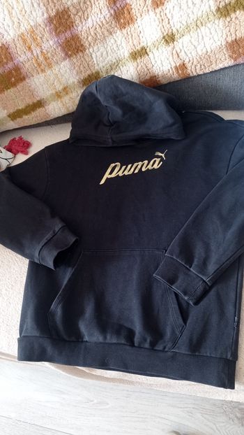 Sweat à capuche Puma noir  et or taille S, très bon état.