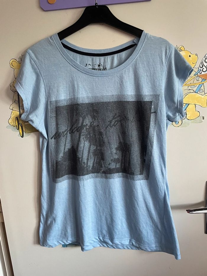 Tee shirt à manches courtes bleu clair à motifs, taille 38, marque Atmosphere