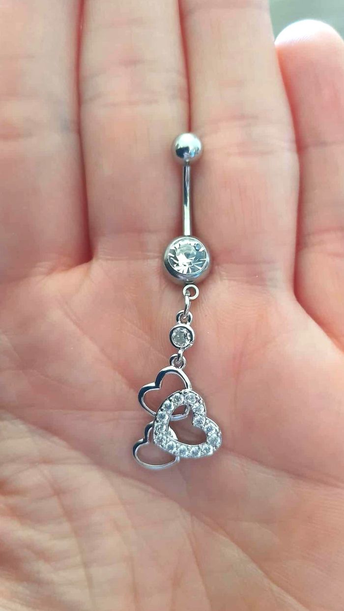 Piercing nombril cœurs entrelacés – neuf