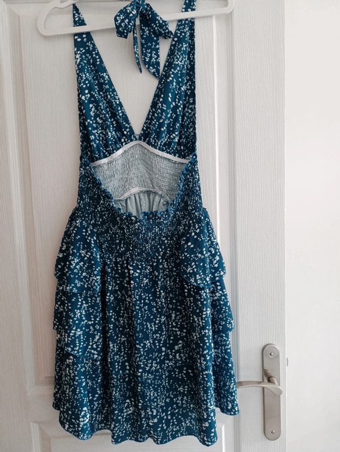 Soleia - Robe courte vacances décontractée
Avec dos vu, col en V et imprimé floral - photo numéro 4