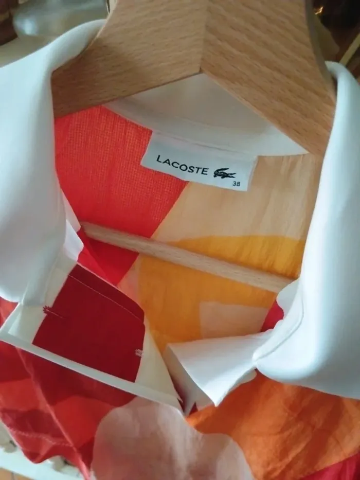 Haut Lacoste femme asymétrique t.38 - photo numéro 2