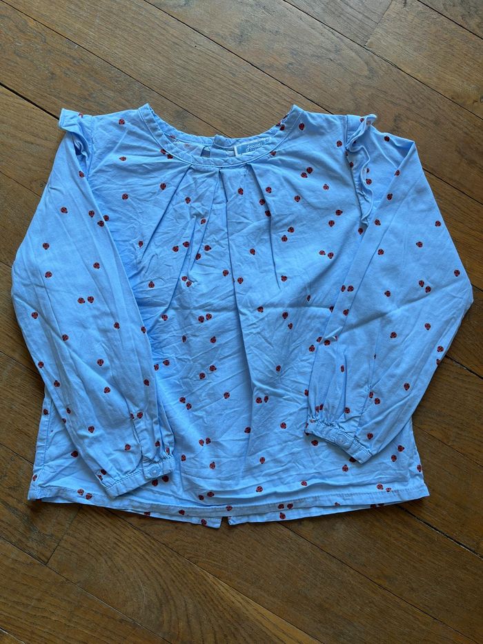 Blouse bleue coccinelles Jacadi 6 ans
