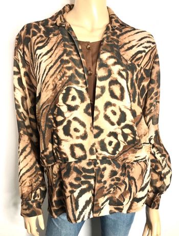 Très jolie blouse léopard vintage taille 42/44 estimée voir mesures