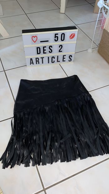 Jupe en simili cuir à franges taille S