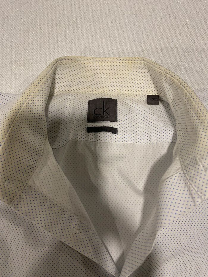 Superbe chemise blanche à motif bleu Calvin Klein taille L 40 traces au col sinon impeccable - photo numéro 9