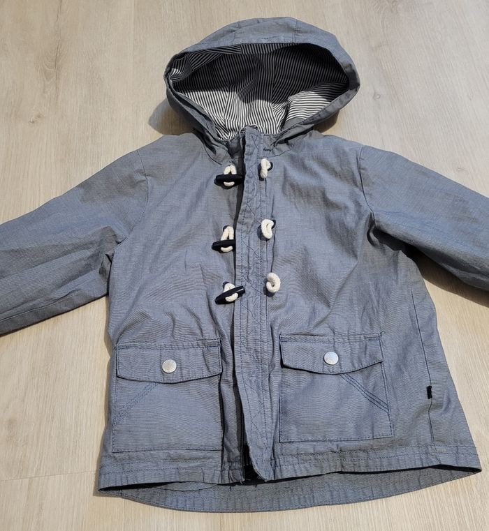 Veste imperméable à capuche  23 mois