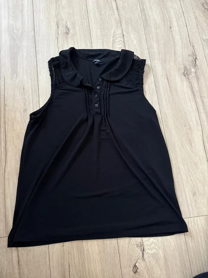 Blouse sans manches noir Kiabi taille M, excellent état