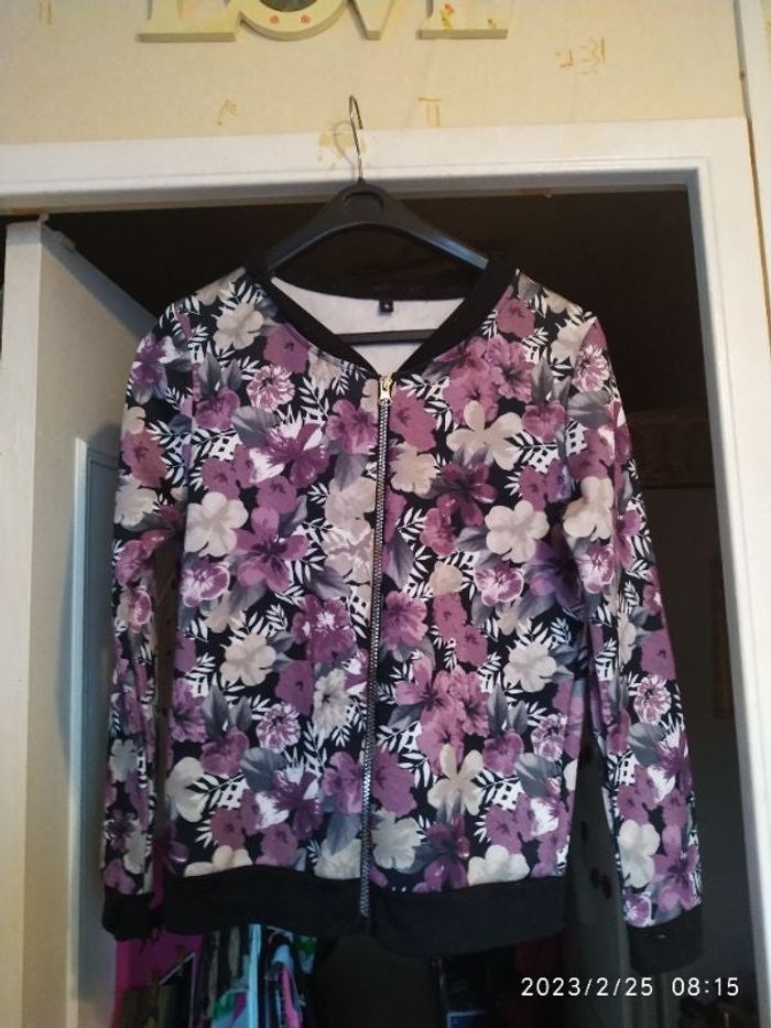 Veste avec fermeture