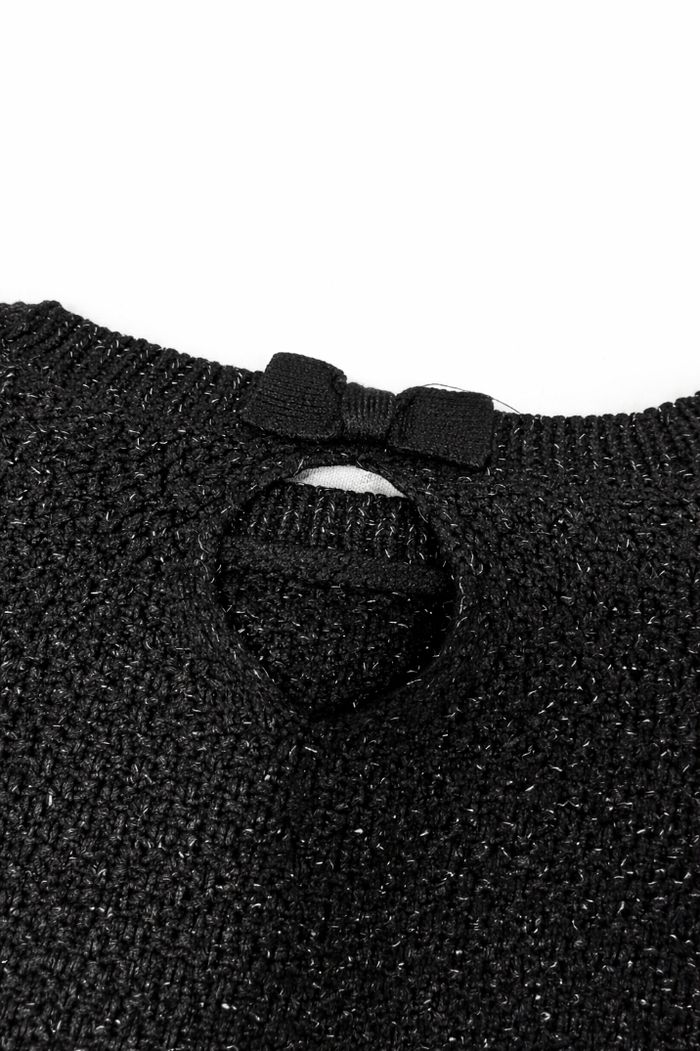 Pull noir a paillettes argentées, file. 5 ans. - photo numéro 2