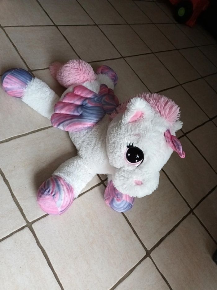 Grande peluche licorne