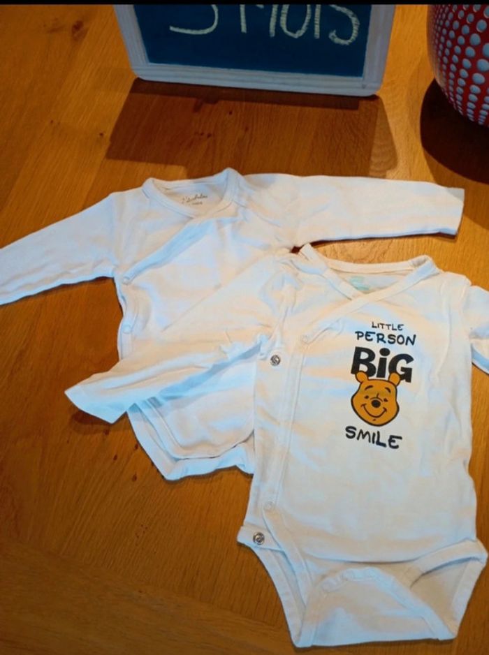 Lot de 2 bodies Orchestra et Kimbaloo taille 3 mois en très bon état