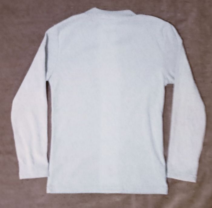 Pull polaire stitch 10 ans neuf - photo numéro 2