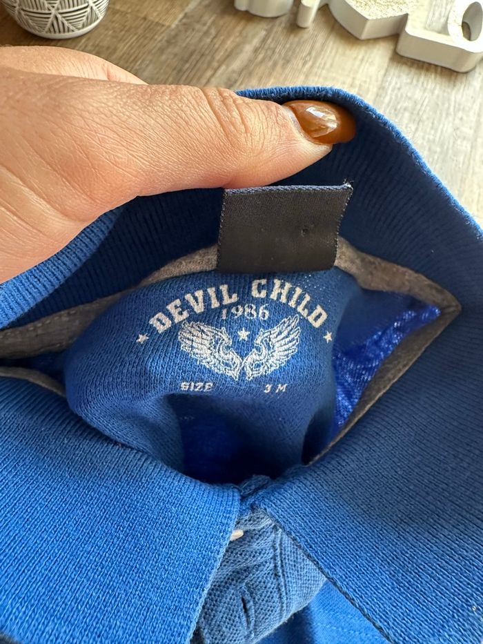 - Polo ML Devil child     - 3 mois  - Très bon état - photo numéro 2