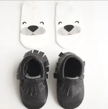 Mocassins Moccs en cuir noir neuves 6/12 mois mixte