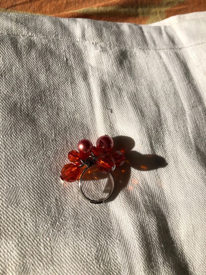Bague pampilles oranges très bon état