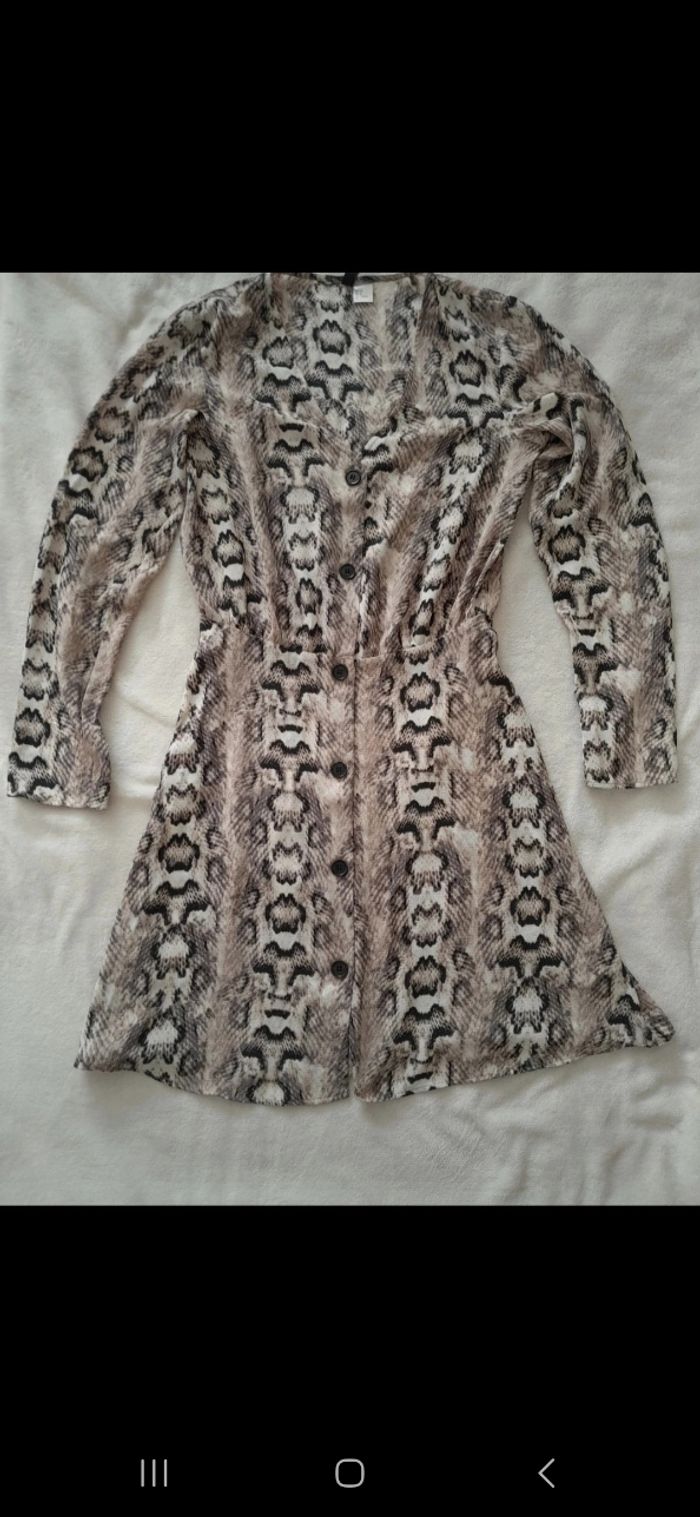 Robe léopard taille 38 M