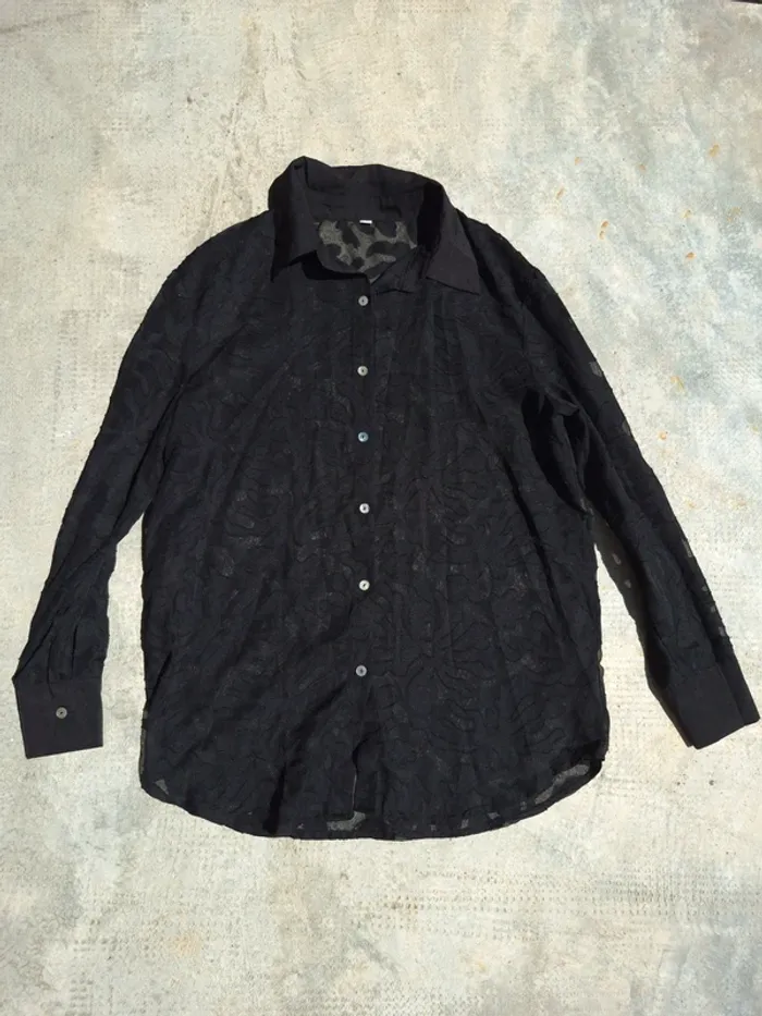 Chemise à bouton transparente noir