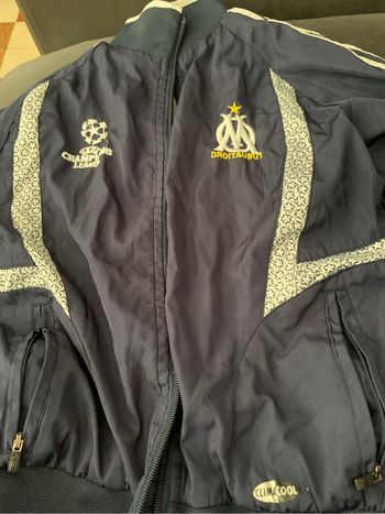 veste OM