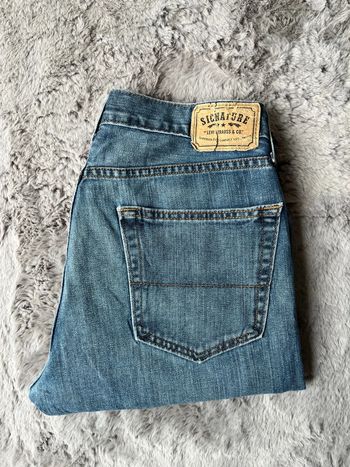 Jean Lévis signature coupe droite W32 L32