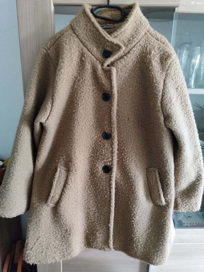 Manteau effet moumoute