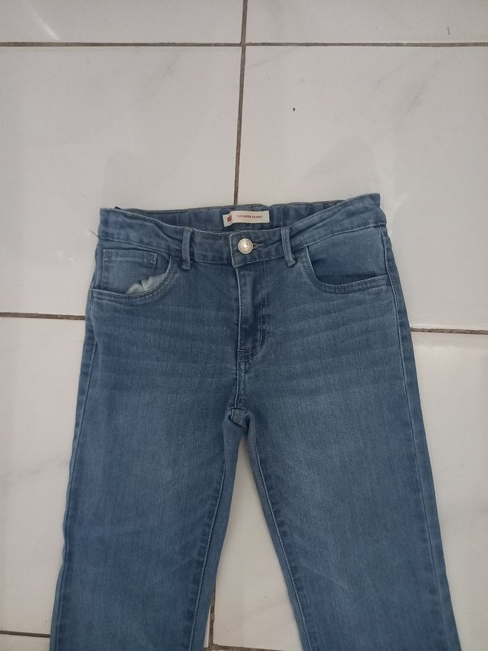 Levi,s fille taille 14 ans couleur bleu clair tres bonne etat - photo numéro 6