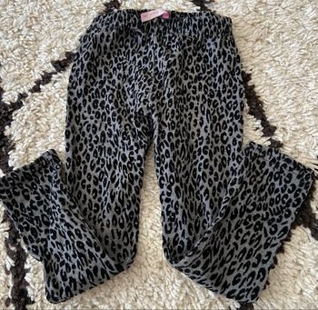 Legging léopard gris et noir taille 4 ans marque gemo