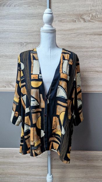 Surchemise / veste légère.