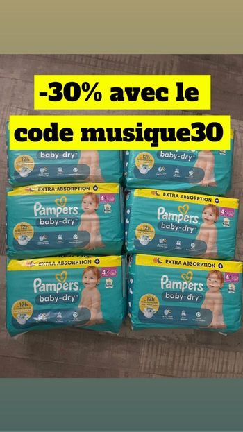 Six paquets de couches Pampers taille 4+