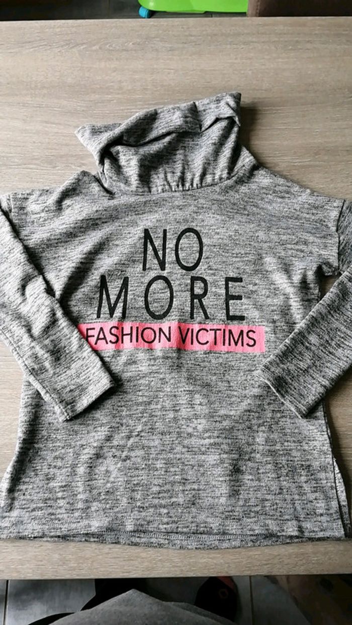 Pull taille s