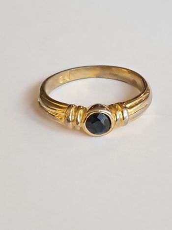Bague vintage ornée d une pierre bleu foncé