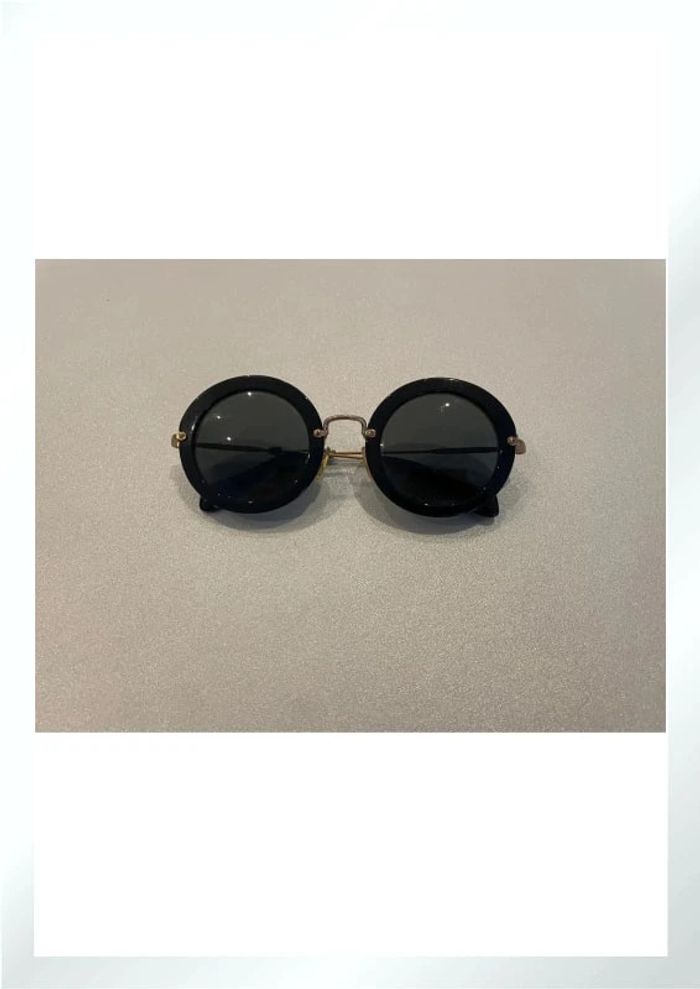Lunettes de soleil MIU MIU