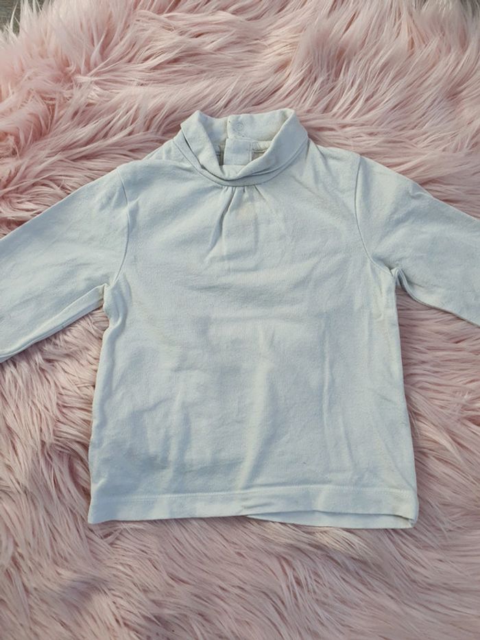 Pull col roulé