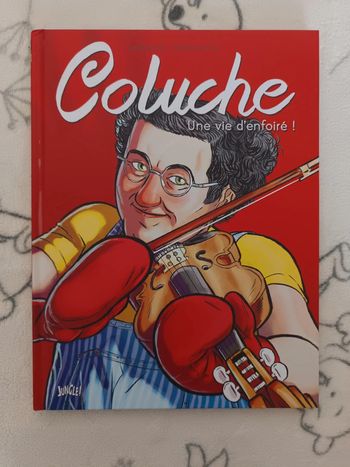 Livre Coluche